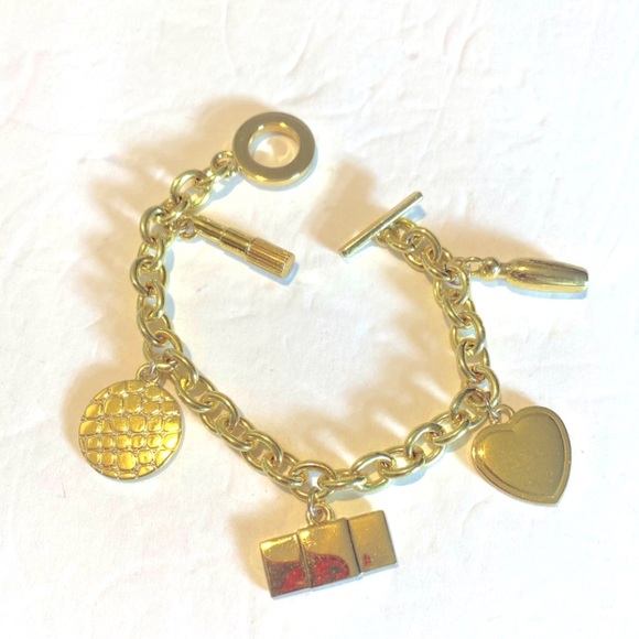 Signed Estée Lauder Gold Tone Charm Bracelet With Five Charms NWOT Size 7” - Picture 2 of 11